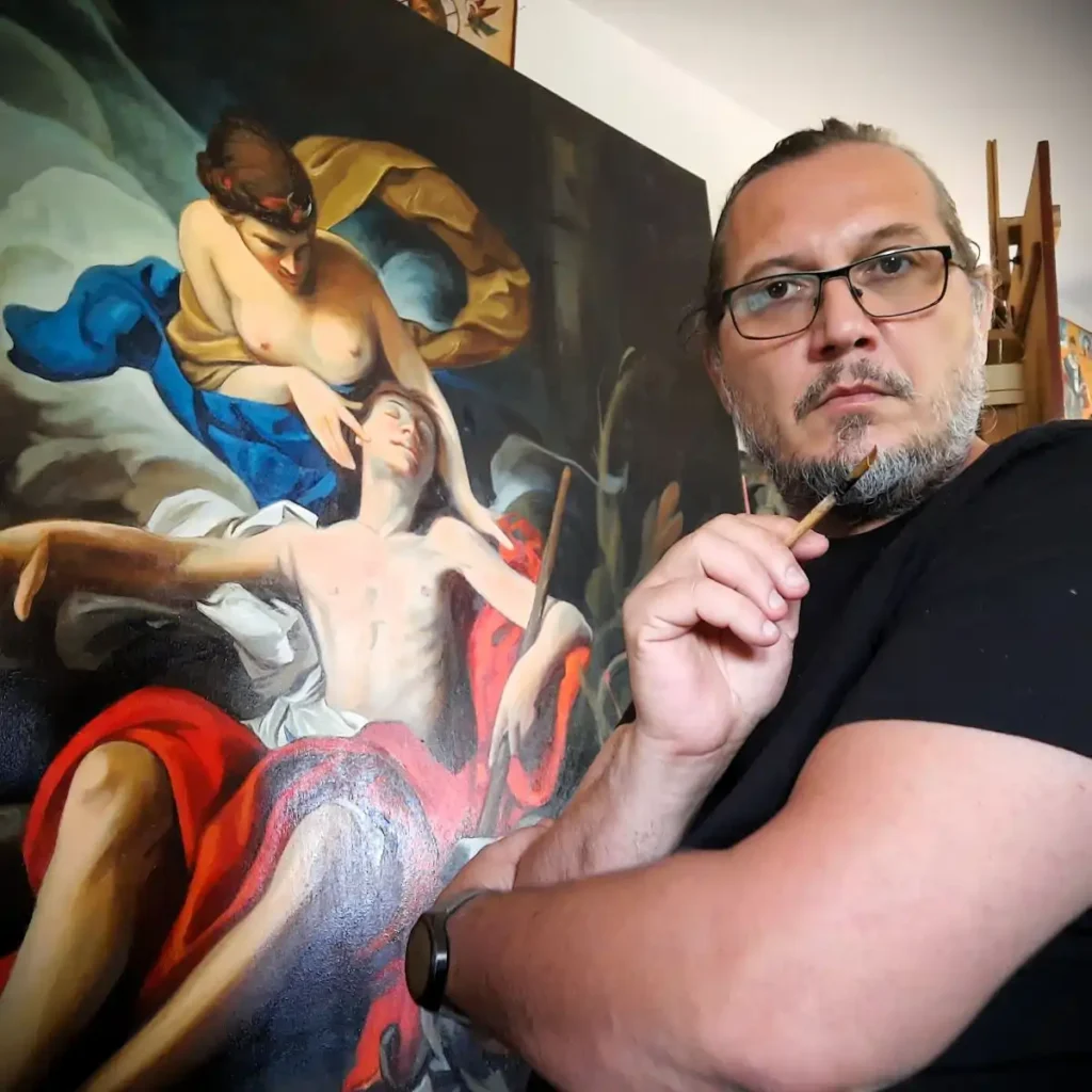 Călin Bogătean, artist portretist, realizând un portret la comandă cu pensula în mână