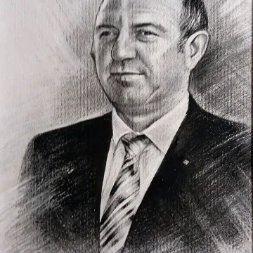 Portret realizat manual în creion după fotografie Portret realist de bărbat realizat în creion după fotografie